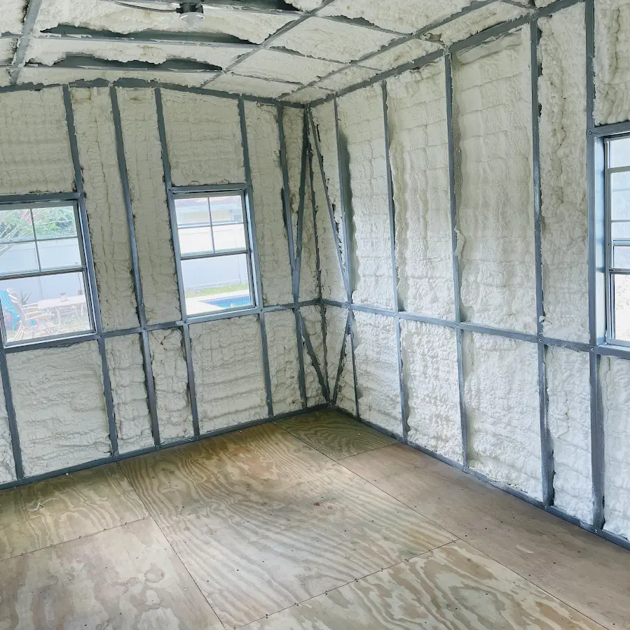 Closed-cell spray foam insulation applied to wall cavities in a residential project in Norwalk